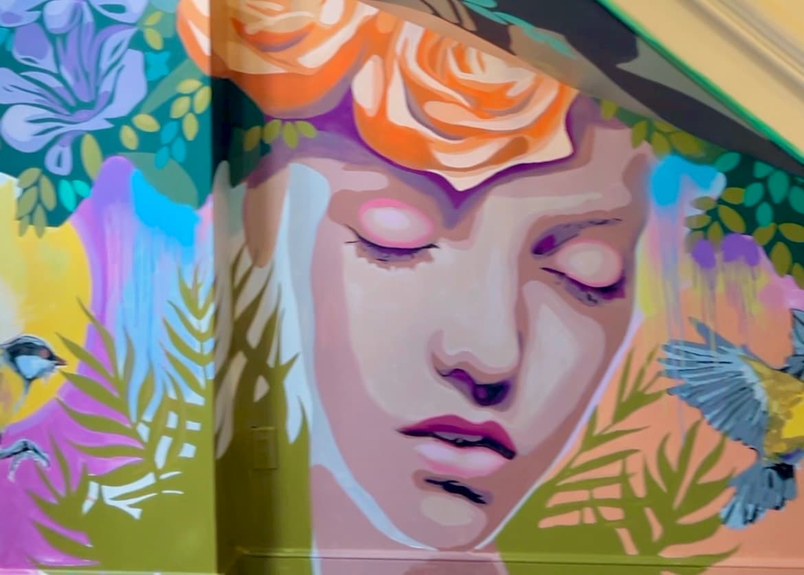 A painted mural inside The Spiral Staircase